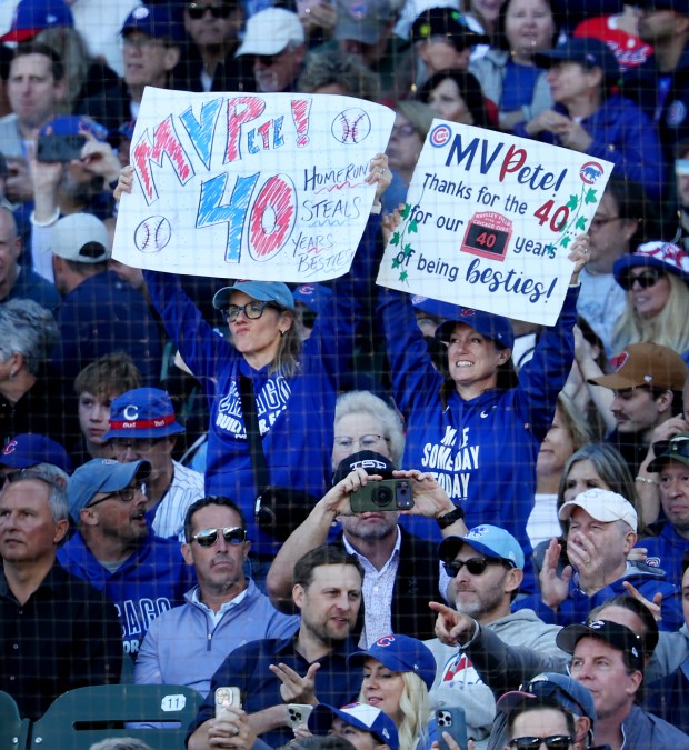 Fans hold up signs showing their love for Cubs center fielder Pete Crow-Armstrong in the third inning of a game against the Marlins on Thursday, Sept. 24, 2026, at Wrigley Field. (Chris Sweda/Chicago Tribune)