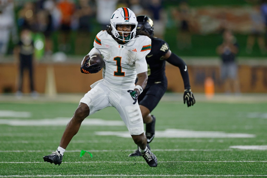 Malachi Toney (1) of the Miami Hurricanes runs with the ball after a reception during the college football game against the Wake Forest Demon Deacons on September 18, 2026 at Allegacy Stadium in Winston-Salem, North Carolina. 