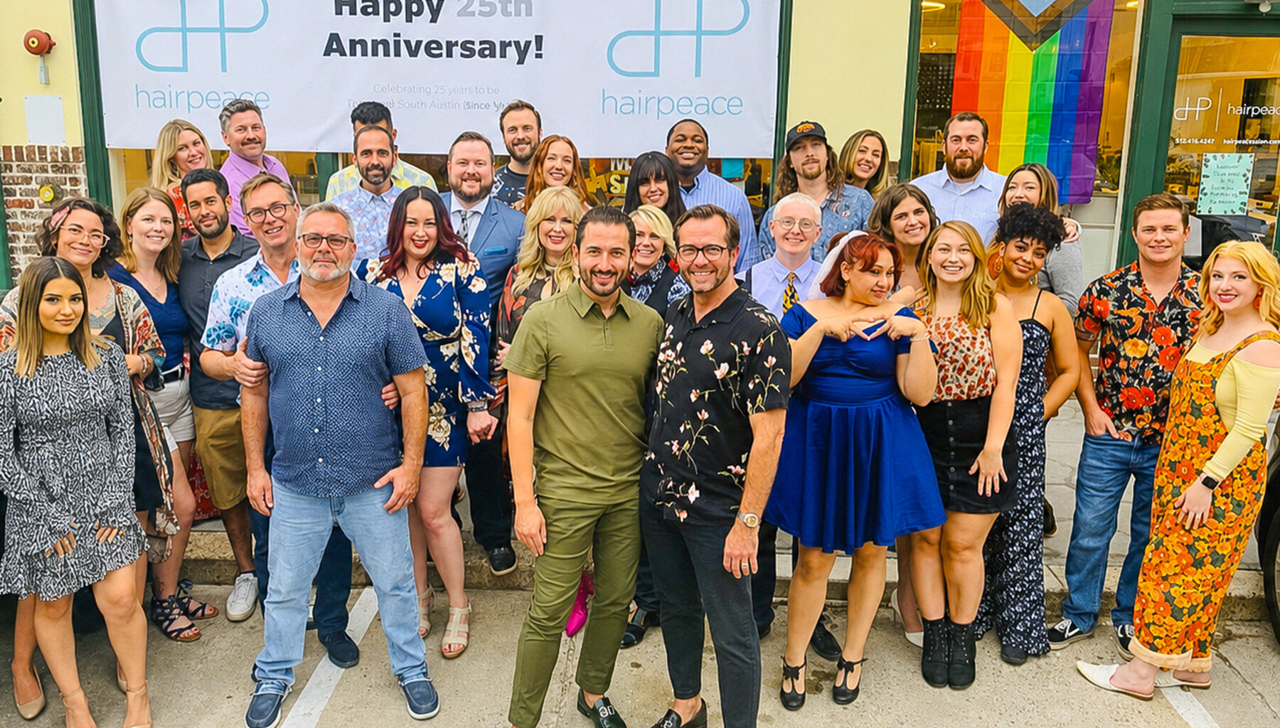 Bruce Musser and the HairPeace team celebrate the salon’s 25th anniversary in 2021.