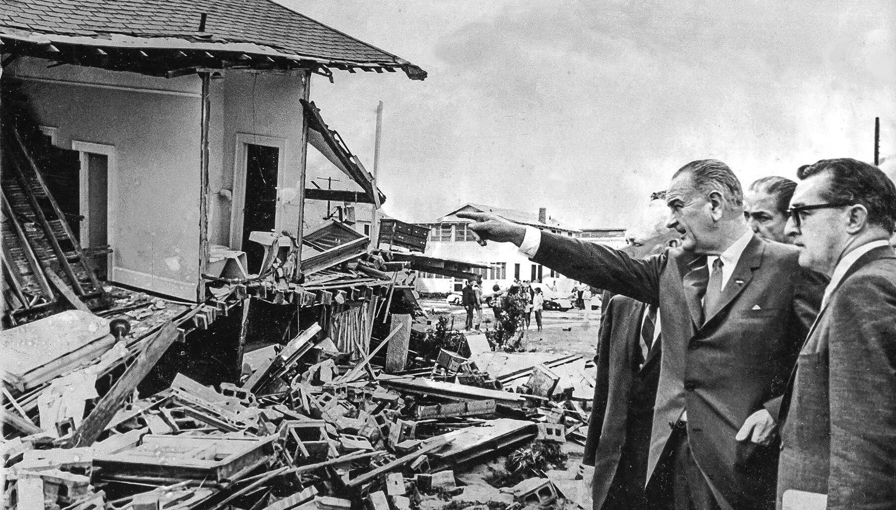 President Lyndon B. Johnson views wreckage from Hurricane Dora on September 11, 1964, in Jacksonville Beach.