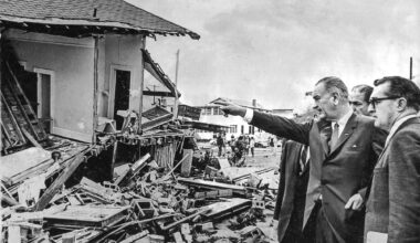 President Lyndon B. Johnson views wreckage from Hurricane Dora on September 11, 1964, in Jacksonville Beach.