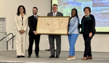 From left to right: Commissioner Yesenia Baron, Mayor Nick Nesta, Commissioner Sam Ruth, Commissioner Nadia Anderson and Vice Mayor Diane Velazquez pose with Apopka's original incorporation papers.
