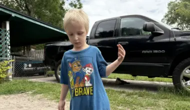 Dog bite victim Roland Moore in his driveway