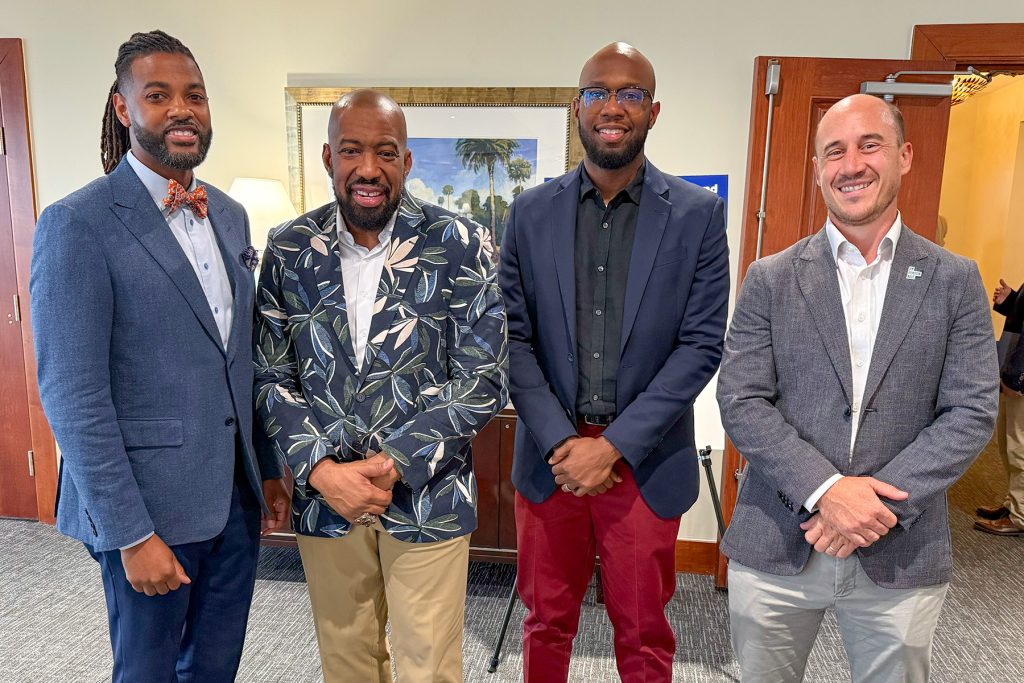 Isaiah Oliver and City Council Member Rahman Johnson with Travis Williams and David Garfunkel