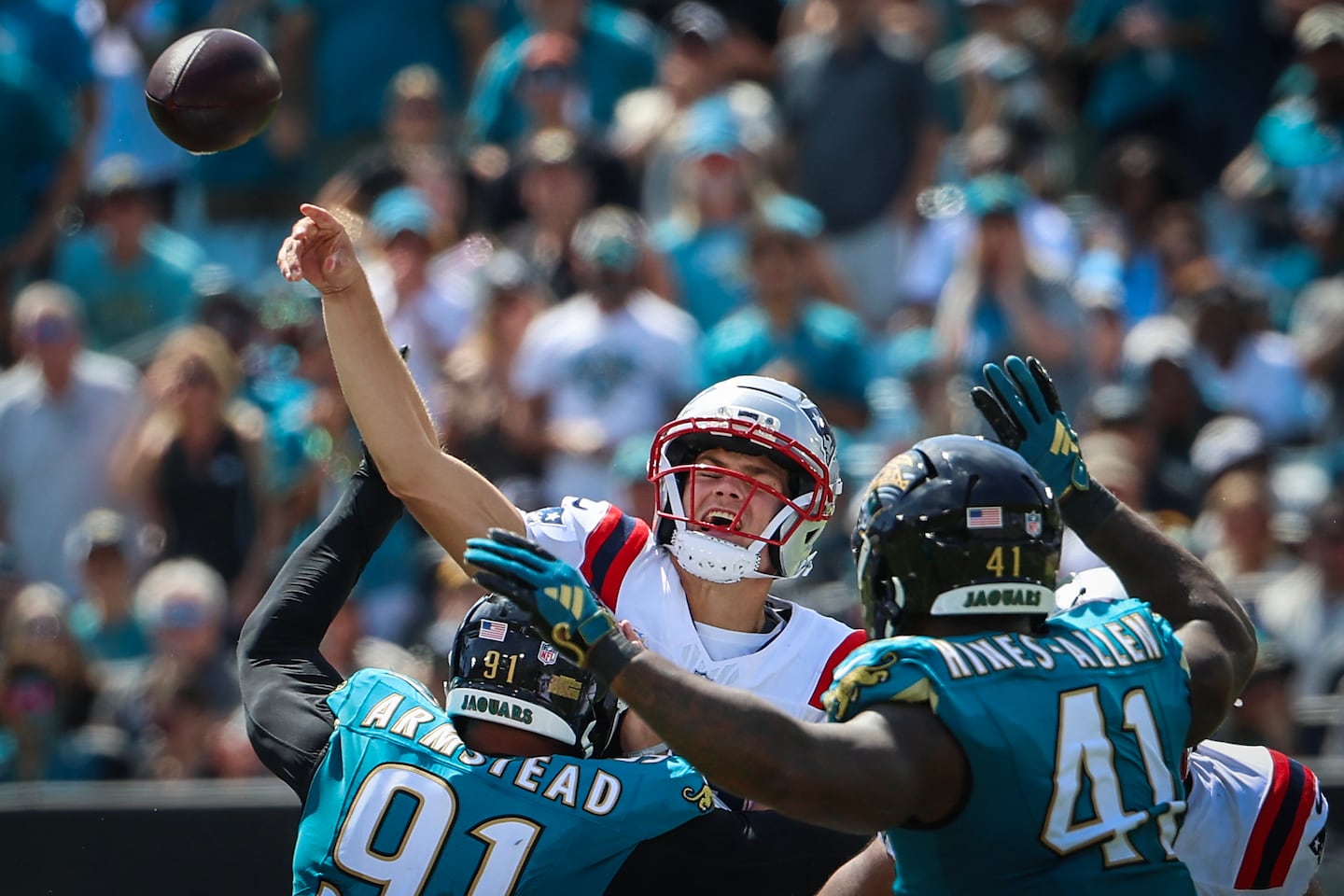 Drake Maye felt the pressure from the Jaguars' defense.