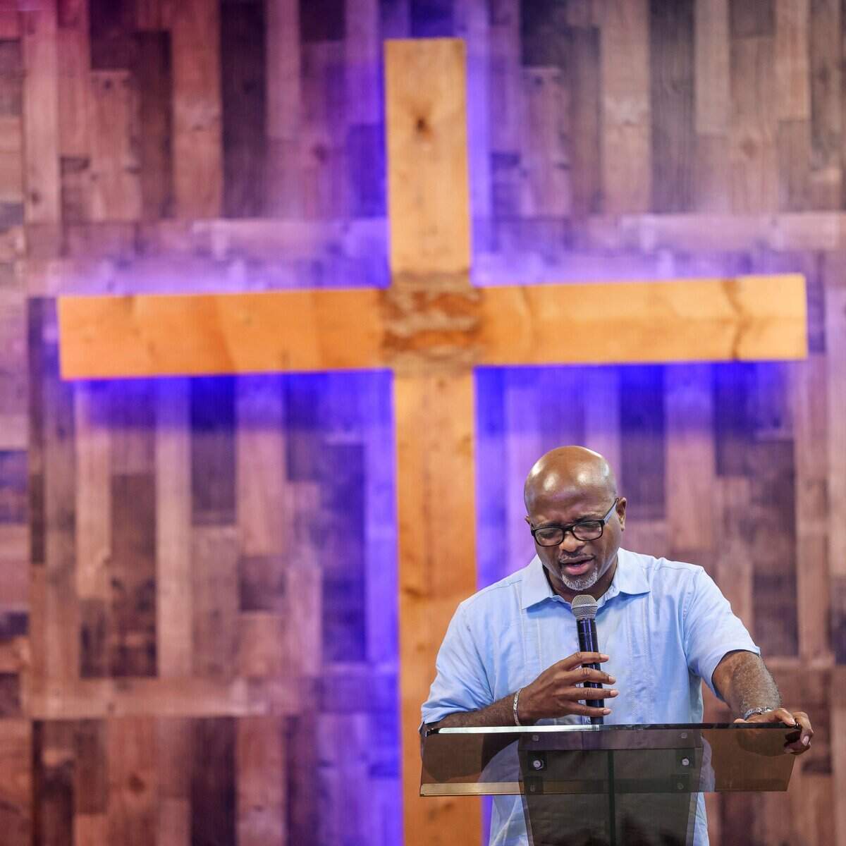 Pastor Keny Felix preaches to his congregation at Bethel Evangelical Baptist Church in Miami Gardens. Attendance has dropped about 20% since Temporary Protected Status ended for more than 300,000 Haitians, he said.