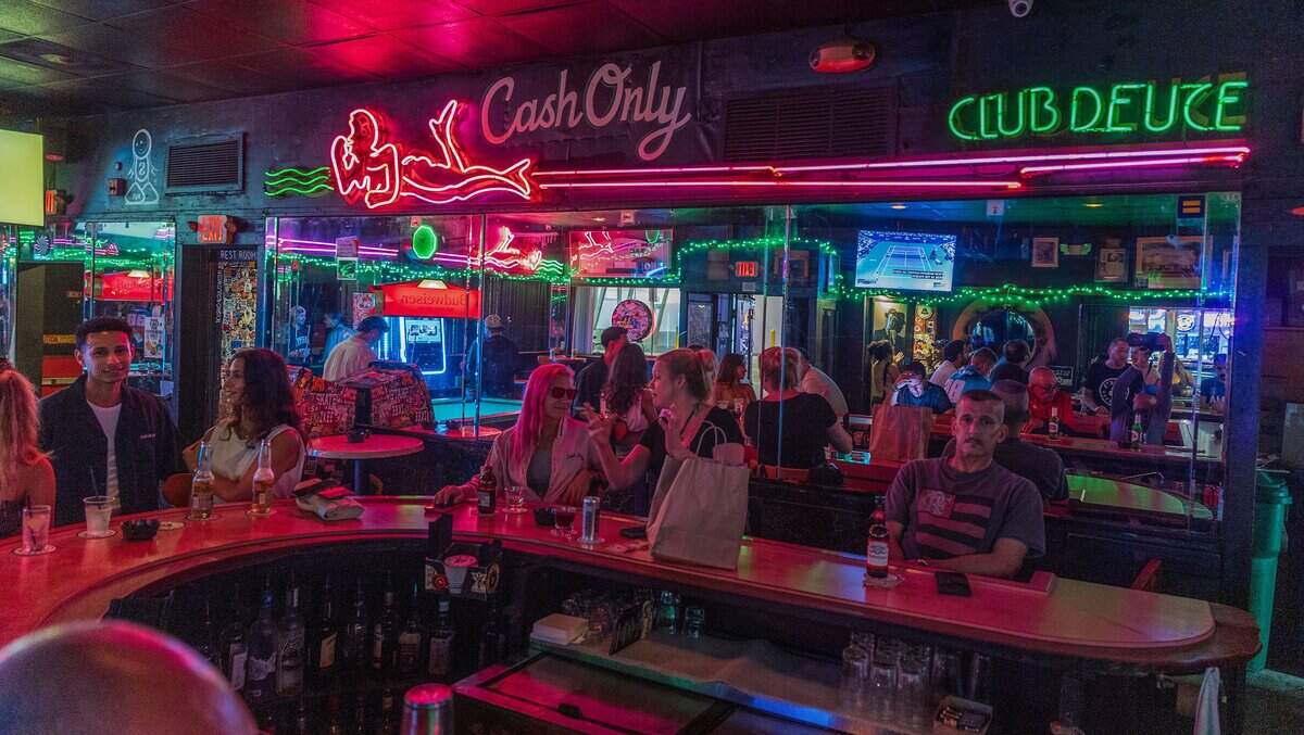 Patrons enjoy Mac's Club Deuce.