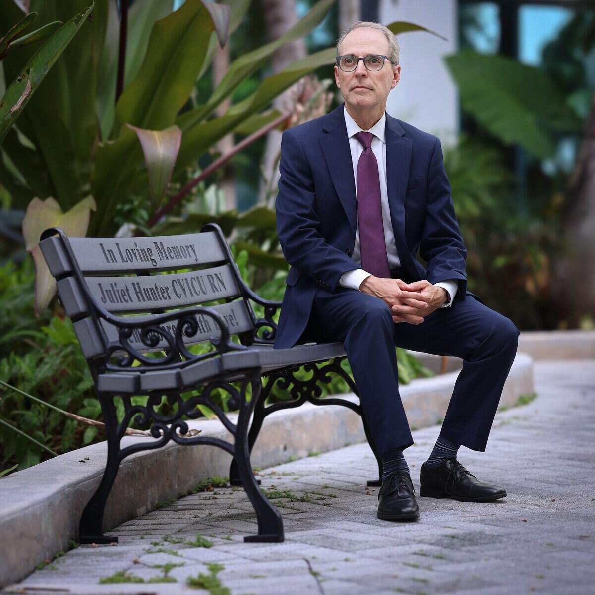 Shane Strum, the CEO of Broward Health and interim CEO of Memorial Healthcare System, believes collaboration between the two sister public health systems will be the key to improving access, and making care better, across the county. Strum sits in the garden of the Broward Health Medical Center in Fort Lauderdale, as part of the medical center's expansion on Thursday, July 23, 2026, in Fort Lauderdale, Fla. The initiative aims to create a countywide pediatric health network that will bring together experts from both Nicklaus and Joe DiMaggio Children's hospitals to provide care.