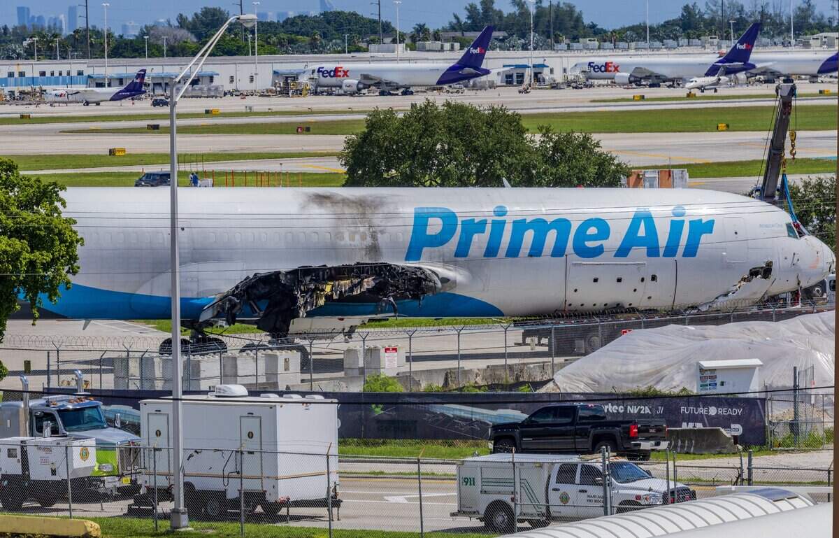 View of the Amazon cargo plane, which crashed over Labor Day weekend after it overshot a runway and hit vehicles, killing five people, that was moved to an open lot at NW 67th Avenue and 25th Street as the National Transportation Safety Board keeps investigating the crash of the Boeing 767-300, which was operated by 21 Air, on September 16, 2026.