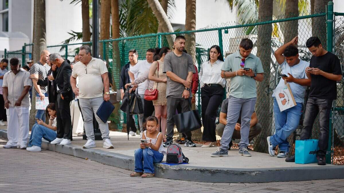 Immigrants wait for appointments outside of Miami Immigration Court in downtown Miami on Wednesday, September 9, 2026.