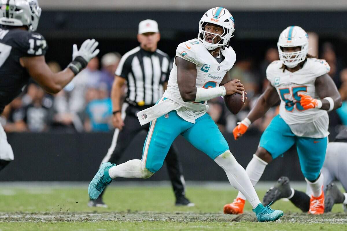 Miami Dolphins quarterback Malik Willis (2) scrambles to the line of scrimmage in the second half Las Vegas Raiders at Allegiant Stadium in Las Vegas, Nevada, on Sunday, September 13, 2026.