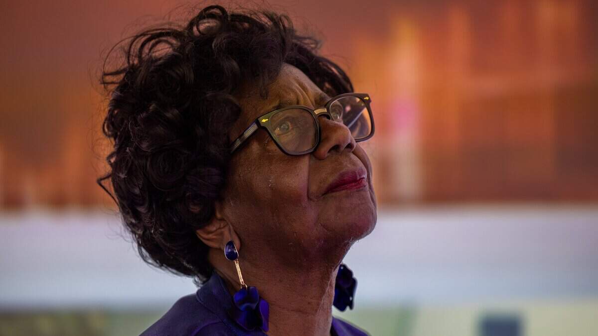 Dr. Dorothy Jenkins Fields, founder of the Black Archives, becomes emotional while viewing the Wishing Wall during a press preview of the “Documents that Forged a Nation” exhibit at the Museum of Miami in Miami, Fla., on Wednesday, June 17, 2026.
