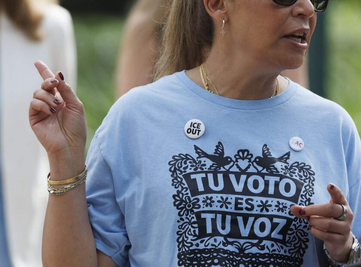 Adelys Ferro, from the Venezuelan American Caucus, speaks during a gathering outside of Doral City Hall on Tuesday, Sept. 22, 2026, in Doral, Fla. Speakers asked Doral City Council to rescind the city's 287(g) agreement with U.S. Immigration and Customs Enforcement (ICE).