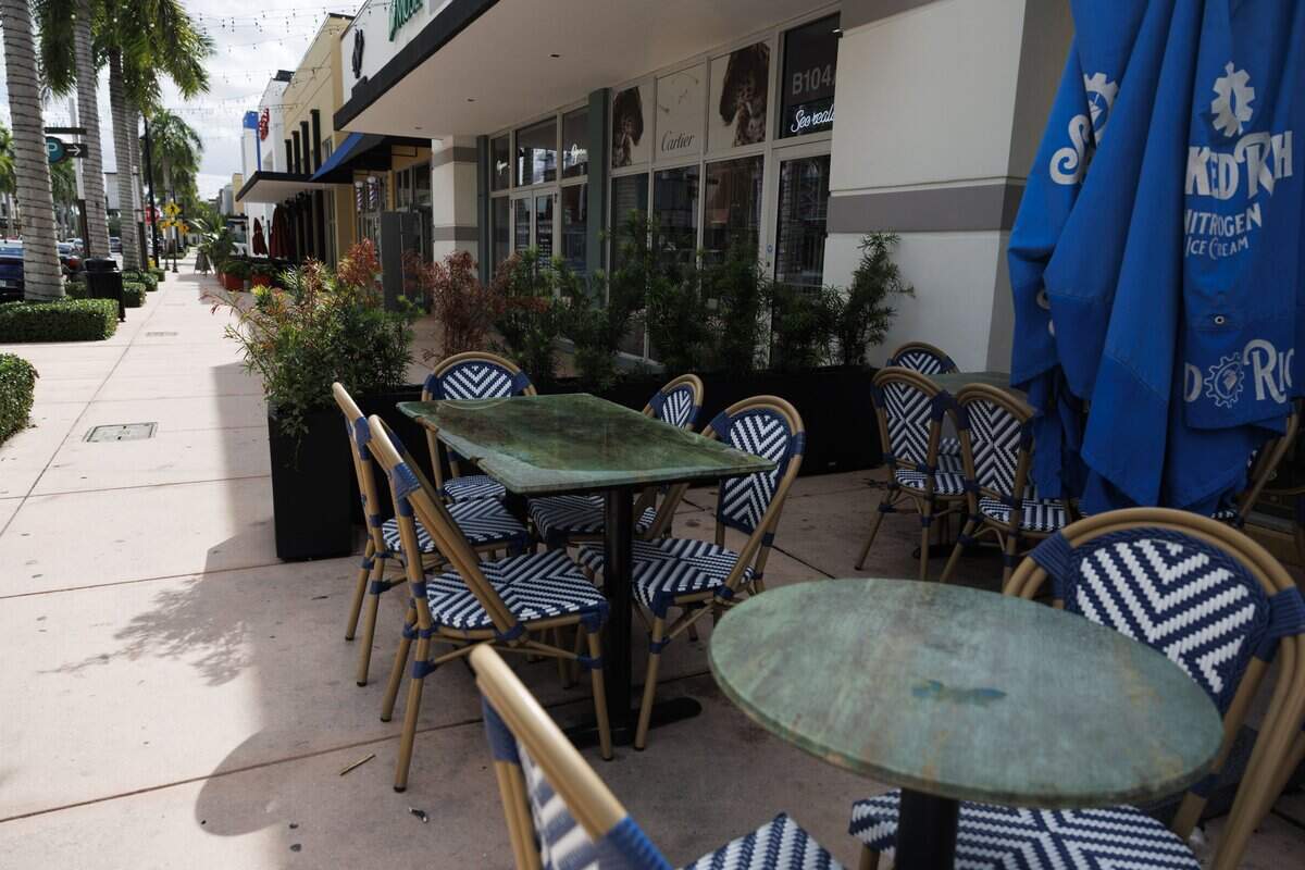 Businesses in downtown Doral deal with empty streets just before lunchtime on Tuesday, Sept. 22, 2026, in Doral, Fla. Owners who prefer not to be named mentioned a steep decline in customers since the agreement has been implemented.