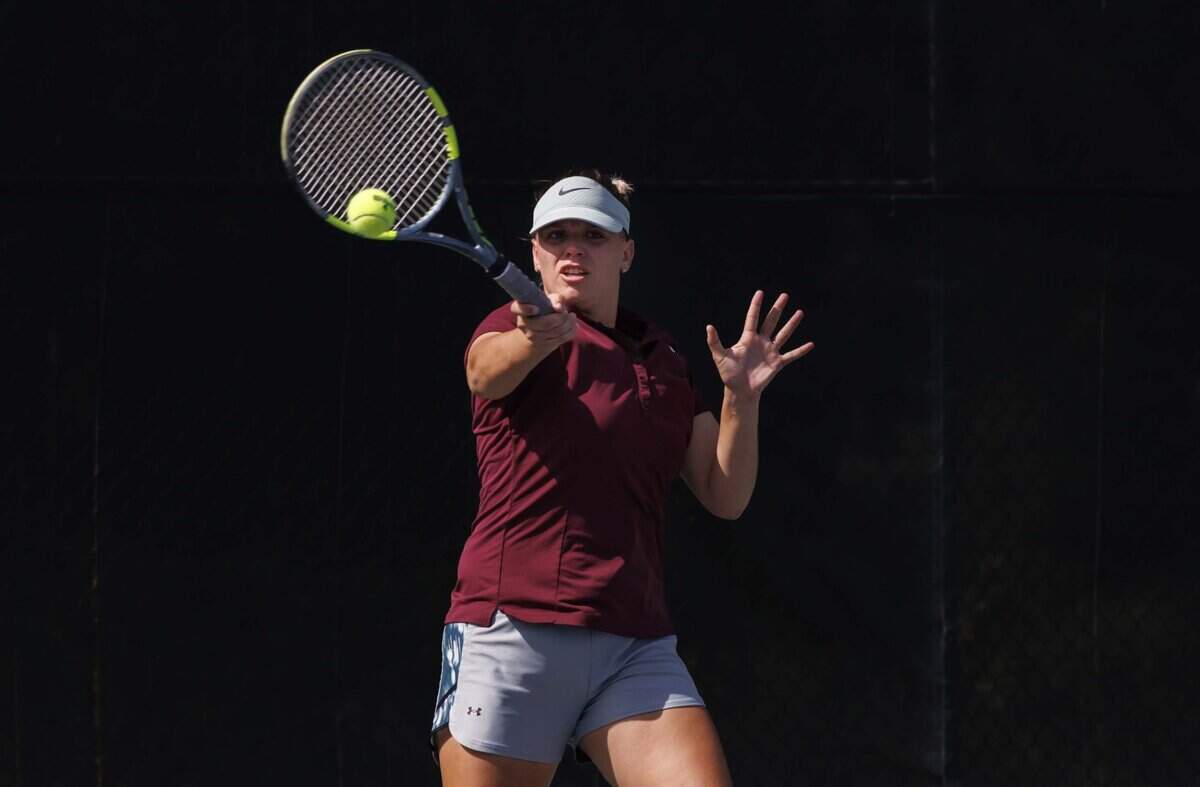 Claudia Carreras, Cuban tennis player who immigrated to the U.S. in 2022, volleys with her coach on Tuesday, July 21, 2026, at the Calusa Park tennis courts on Key Biscayne. Carreras founded “Turn on Tennis” in Miami.