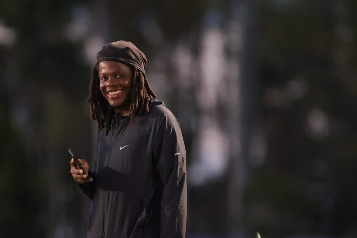 Tampa Bay Buccaneers quarterback and former Miami Northwestern coach Teddy Bridgewater attends a high school football game between the Bulls and the Columbus Explorers at Tropical Park in Miami, Florida, Friday, September 19, 2025.