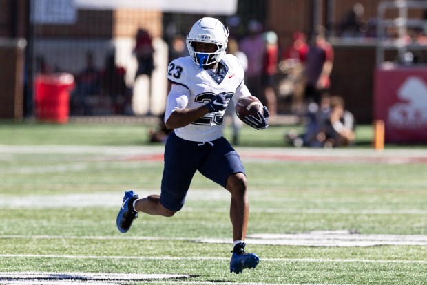 UConn running back Cyncir Bowers looks for room during Saturday's game at Miami, Ohio. (Courtesy of UConn) 