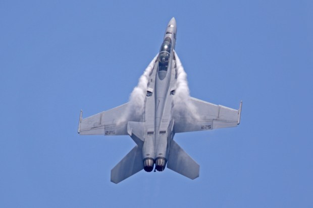 F/A-18F Super Hornet performs during Fort Lauderdale Air Show at Fort Lauderdale Beach, May 6, 2018. The show features some of the nation's most popular military jet demonstrations, parachute teams, civilian aerobatic acts and formation flight teams. (John McCall/South Florida Sun Sentinel)