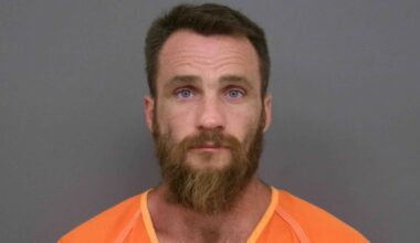 Cherokee County sheriff identifies man still involved in standoff