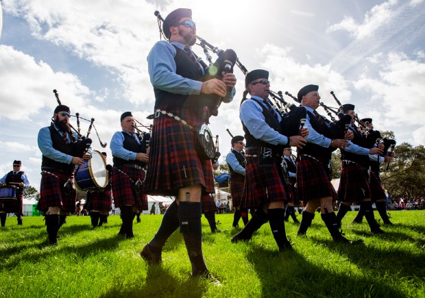 Pipers and drummers from Rosie O'Grady's Highlanders march during the 43rd annual Central Florida Scottish Highland Games at Central Winds Park in Winter Springs on Saturday, Jan 18, 2020. (Patrick Connolly/Orlando Sentinel)