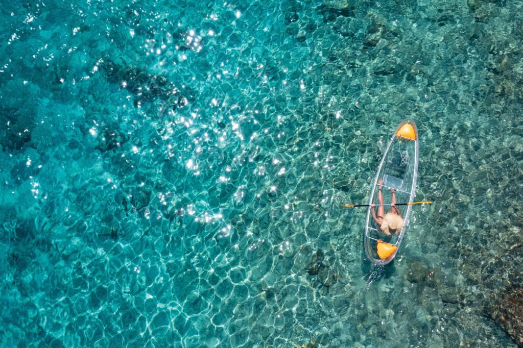 Paddle crystal-clear waters with Get Up and Go Kayaking. Photo courtesy of iStock