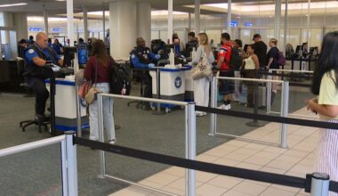 TSA officers work at security checkpoints at the Orlando International Airport. (Spectrum News)