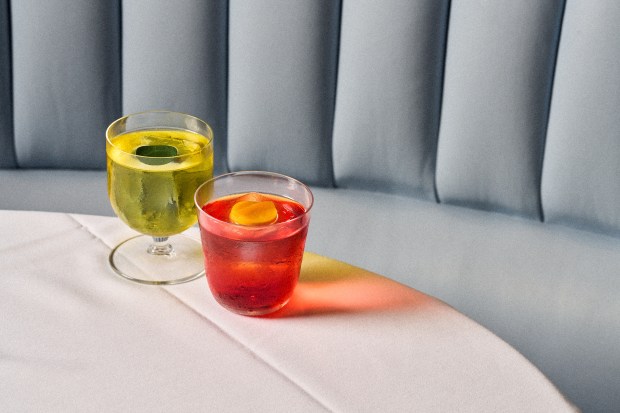 LPM Restaurant & Bar Miami is offering three specialty Negronis, including the Negroni Provencal, left, and Buttered Mango Negroni, right, and the 1796 Americano (not shown) during Negroni Week. (LPM Restaurant & Bar Miami/Courtesy)