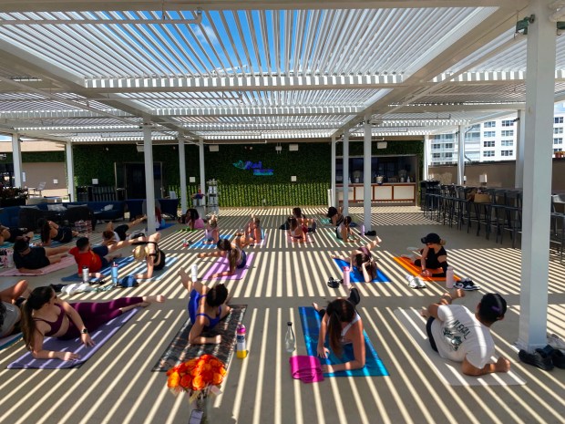 Head up to the Pier 6 Rooftop at Home2Suites by Hilton for Pilates & Mimosas with an ocean view. (Sarah Reimer/Courtesy)