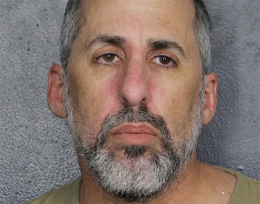 Assistant principal arrested on robbery, domestic violence charges