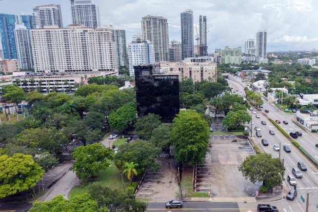 Two towers rising 28 and 22 stories would be connected by a nine-story podium with 841 parking spaces on this site at 633 S. Federal Highway in Fort Lauderdale, shown Wednesday. (Amy Beth Bennett/South Florida Sun Sentinel)