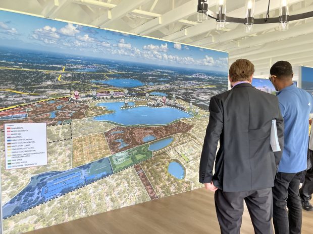 Visitors could see billboard-sized renderings of the RoseArts District throughout the community and in the former golf clubhouse. (Staff photo)