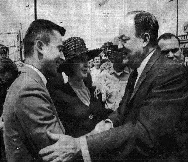 Orlando's John Young, left, shakes hands with U.S. Vice President Hubert H. Humphrey with Young's wife Barbara alongside during John Young Day on April 24, 1965, a day to honor the hometown astronaut's first spaceflight with Gus Grissom earlier that year on Gemini III. (Orlando Evening Star file/Frank Russell)