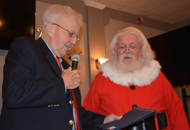 Steinway Society of Orlando founder Gary Grimes and Santa Claus will be gifting pianos once again to deserving children. (Courtesy Steinway Society)