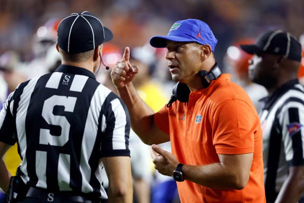 Florida coach Jon Sumrall is 18-4 as a head coach in true road games, including a 44-49 win Sept. 19 at Auburn. (Photo by Butch Dill/Getty Images)