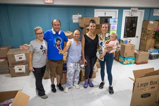 Volunteers help to accept and sort donations to send to Colombia at the Mecatos Bakery warehouse in Orlando on Aug. 28, 2026. Colombians in Central Florida are rallying to send supplies and humanitarian relief to the hardest hit areas of Colombia following a 7.4-magnitude earthquake that struck on Aug. 10. (Patrick Connolly/Orlando Sentinel)