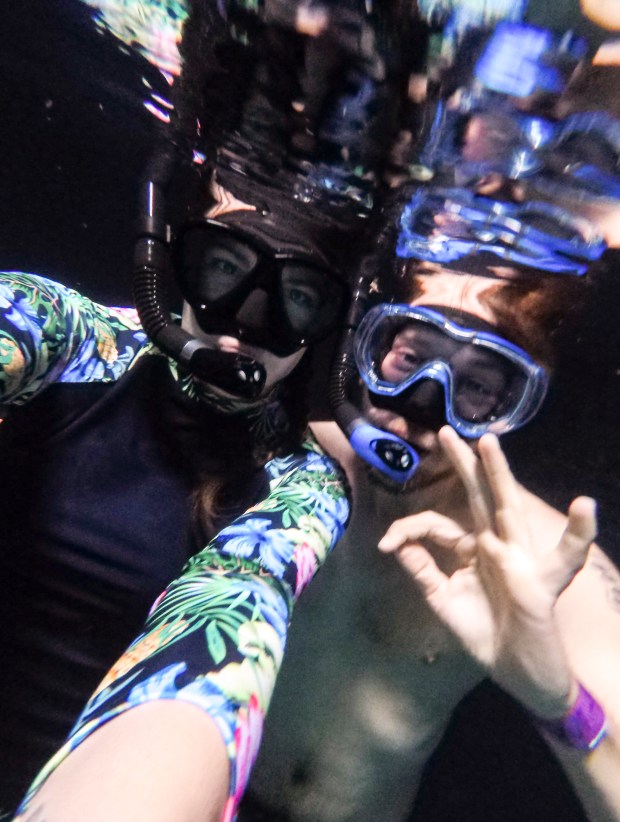 Patrick Connolly and Karissa Bellile enjoy a visit at Devil's Den Spring in Williston on Feb. 27, 2026 (Patrick Connolly/Orlando Sentinel)