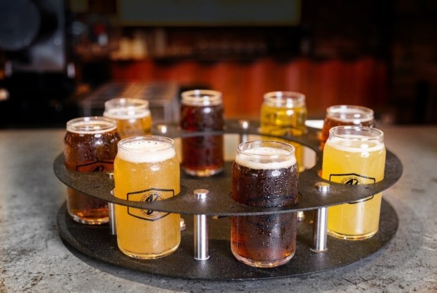 For Oktoberfest, Brewlando's team has prepared a "round trip" on Germany's famed Autobahn that includes eight German-style pours. So many they had to design an all-new flight tray to include them all! (Photo courtesy Brewlando)