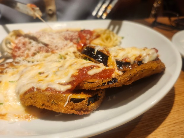 At the Winter Park Village Olive Garden, eggplant parm was fresh, hot, crispy. My dining companion was very happy with it. (Amy Drew Thompson/Orlando Sentinel)