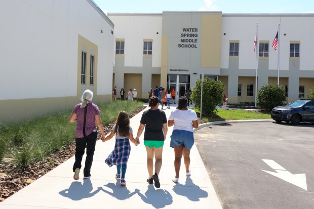 Students and families explore the campus of the new Water Spring Middle School in Winter Garden during a "sneak peek" event held on Friday, August 7, 2023. The new school, built in the fast-growing Horizon West community in east Orange County, will welcome students for the 2023-2024 school year. (Rich Pope, Orlando Sentinel)