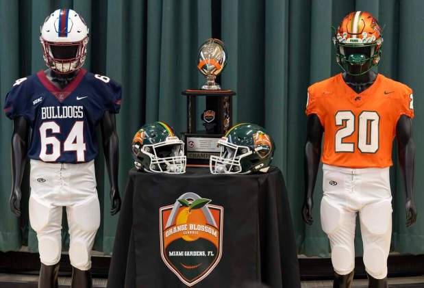 The uniforms for South Carolina State Bulldogs, Florida A&M Rattlers and the championship trophy are on display during an Orange Blossom Classic press conference at the Miami Gardens City Hall on Wednesday, March 25, 2026, in Miami Gardens, Fla. The event was held in anticipation of the Labor Day football game between the Florida A&M Rattlers and the South Carolina State Bulldogs at Hard Rock Stadium. (Matias J. Ocner/Miami Herald)