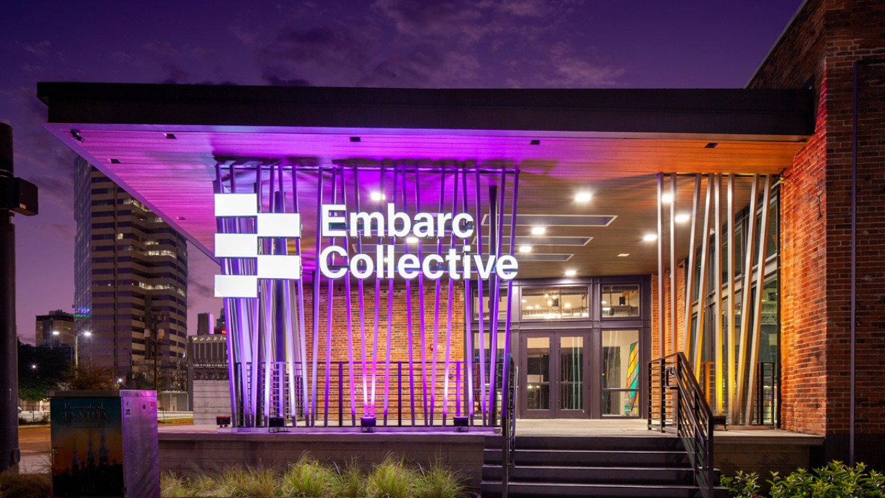 Embarc Collective headquarters illuminated at night in Tampa