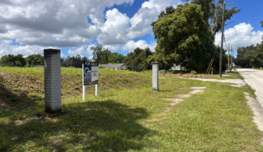 A “For Sale” sign remained Wednesday at the vacant 350 E. Sixth St. property where Habitat for Humanity Seminole-Apopka is seeking to revive plans for 24 affordable townhomes. Orange County property records identify Habitat as the owner of the proposed townhome parcels.