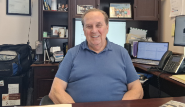 Skip Strohm sits in his office at Strohm Insurance in Apopka. Strohm, who grew up on Long Island, remembers watching the World Trade Center's Twin Towers rise during childhood trips into Manhattan with his father and later witnessing the aftermath of the Sept. 11, 2001, terrorist attacks.  