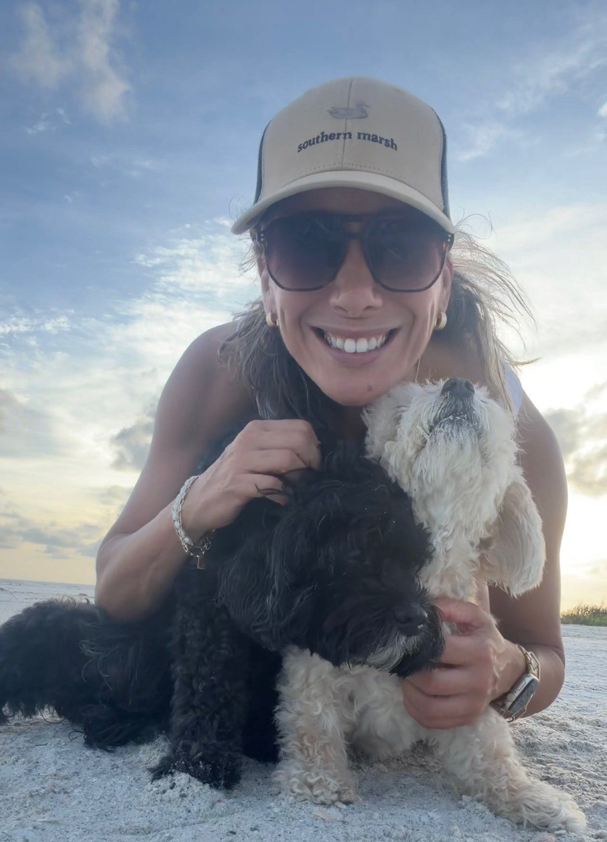 Gabrielle Bolen, founder of the new Rainbow Bridge Pet Memorial in Fort Myers, with her cavapoos Mia and Koda