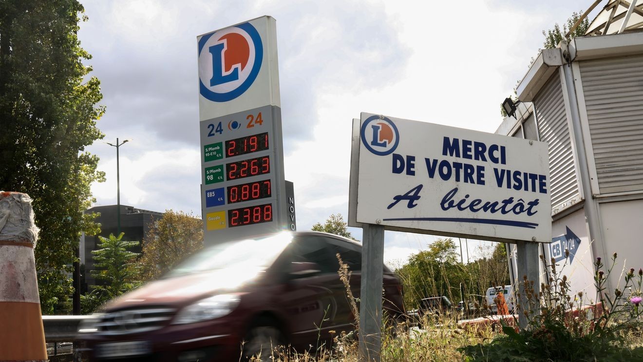 PARIS, FRANCE - SEPTEMBER 18: A vehicle drives past a sign showing the price of fuel at an E.Leclerc gas station on September 18, 2026 in Paris, France. Fuel prices in France have continued to rise in recent weeks, with around one in ten filling stations reporting shortages of at least one type of fuel. Amid growing protests by fishermen and other groups impacted by high fuel costs, Prime Minister Sebastien Lecornu has extended emergency fuel subsidies for agriculture, fishing and construction sectors through the end of the year. Meanwhile, President Emmanuel Macron is convening leaders of France's political parties to discuss the impact of conflicts in the Middle East and Ukraine on France's energy supplies, as the government seeks to push through its upcoming 2027 budget ahead of next year's presidential election. (Photo by Tom Nicholson/Getty Images)