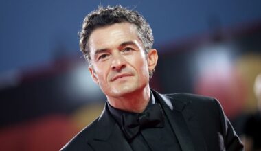 Orlando Bloom flaunts his rock-solid abs during family getaway