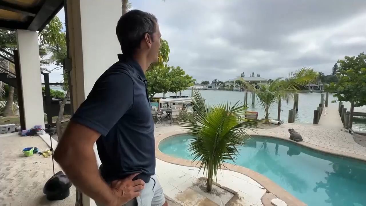 Many homes and businesses on Treasure Island were damaged because of storm surge from Hurricane Helene two years ago. But for some, like Hendrik Bisanz (pictured here), it was an opportunity to build back.