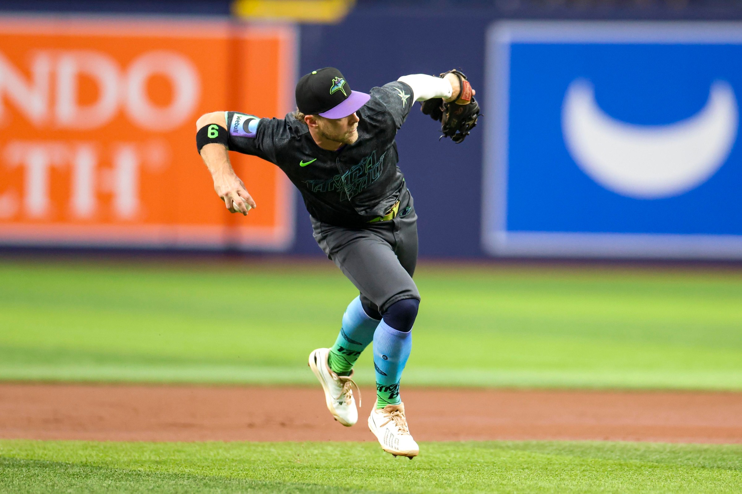 ST PETERSBURG, FLORIDA - AUGUST 29: Taylor Walls #6 of the Tampa Bay Rays barehand fields a ball in the top of the first inning against the San Diego Padres at Tropicana Field on August 29, 2026 in St Petersburg, Florida. (Photo by Parker Freedman/Getty Images)