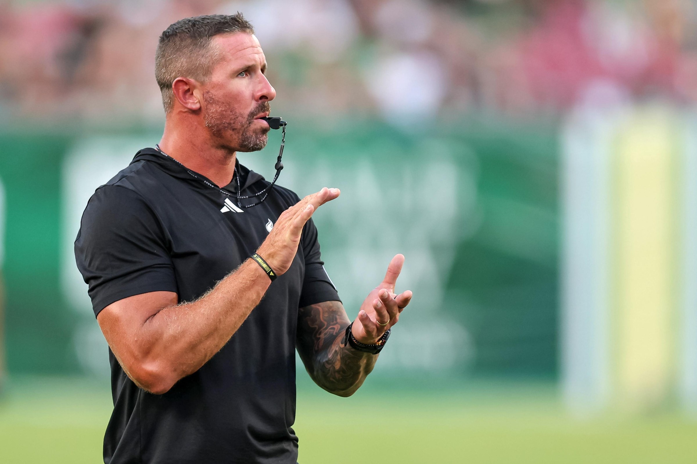 TAMPA, FLORIDA - SEPTEMBER 5: Head coach Brian Hartline of the South Florida Bulls before his debut against the Florida International Panthers at Raymond James Stadium on September 5, 2026 in Tampa, Florida. (Photo by Mike Carlson/Getty Images)