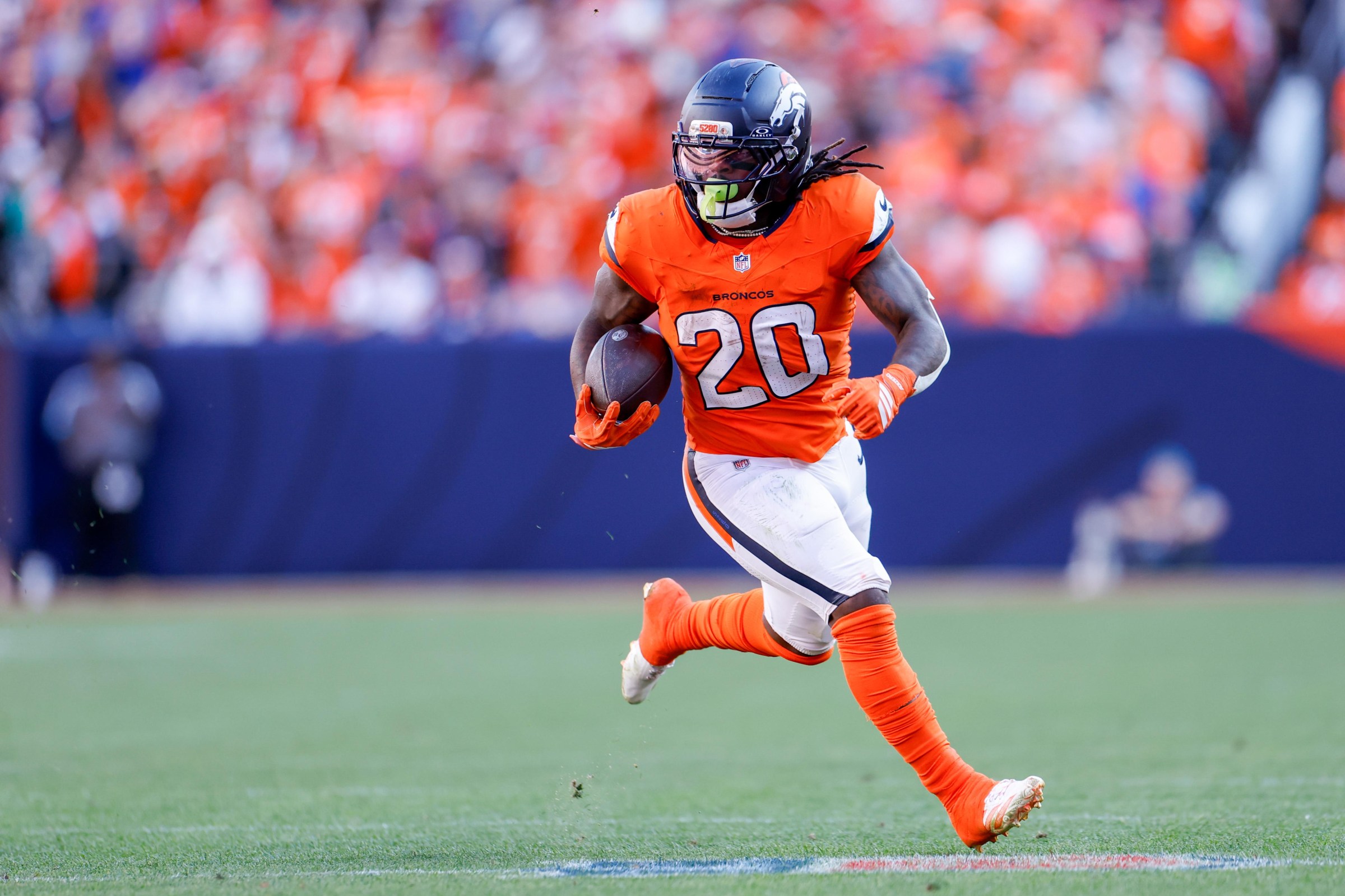 DENVER, COLORADO - SEPTEMBER 20: Jonah Coleman #20 of the Denver Broncos runs the ball during the fourth quarter of a game against the Jacksonville Jaguars at Empower Field At Mile High on September 20, 2026 in Denver, Colorado. (Photo by Lauren Leigh Bacho/Getty Images)